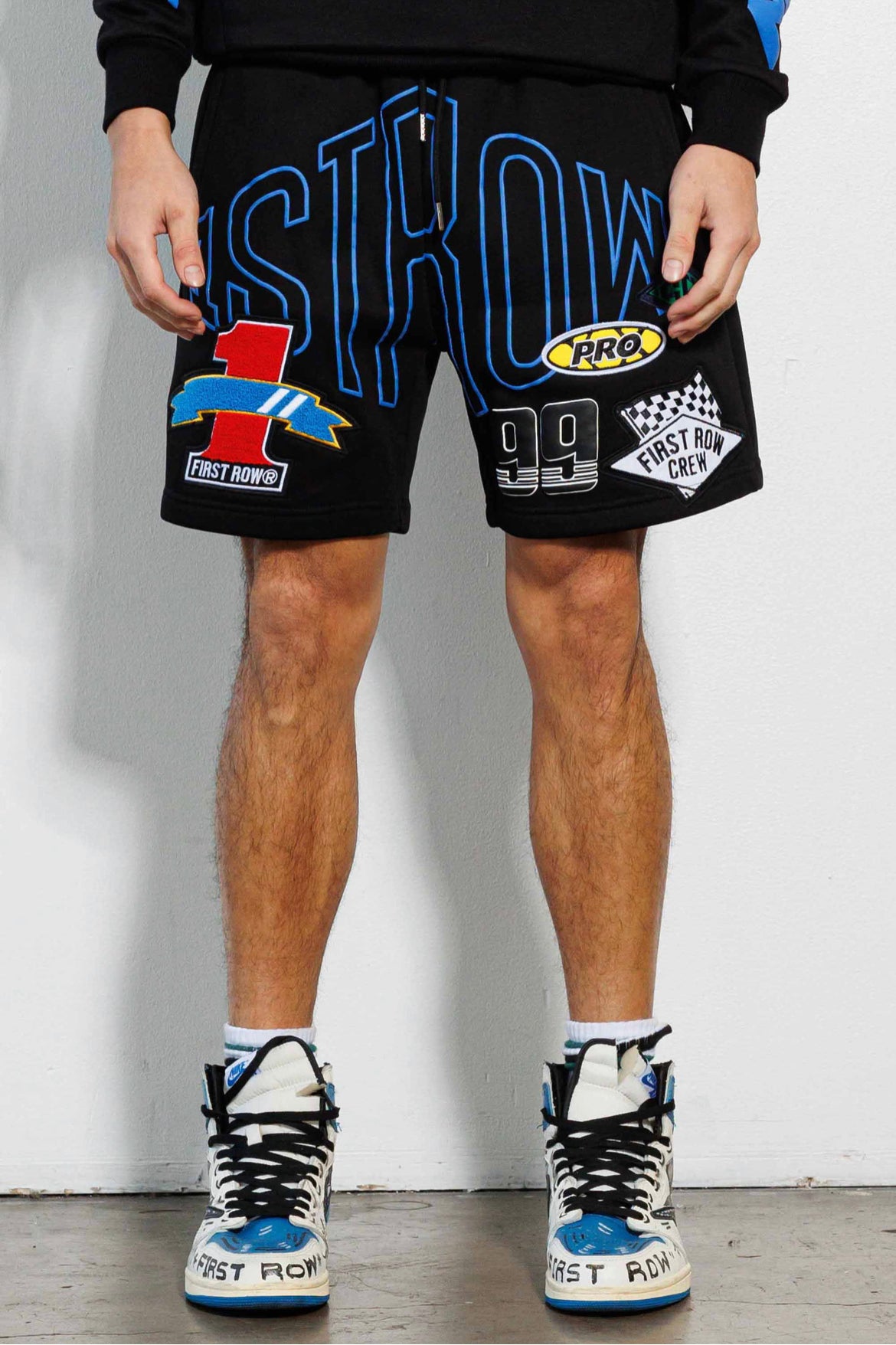 First Row (racing multi patched graphic shorts)